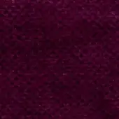 Plum looped fabric texture with a dense, nubby pile and matte finish; subtle dye flecks and “swan > fabric (h) > h 433 23” text visible.